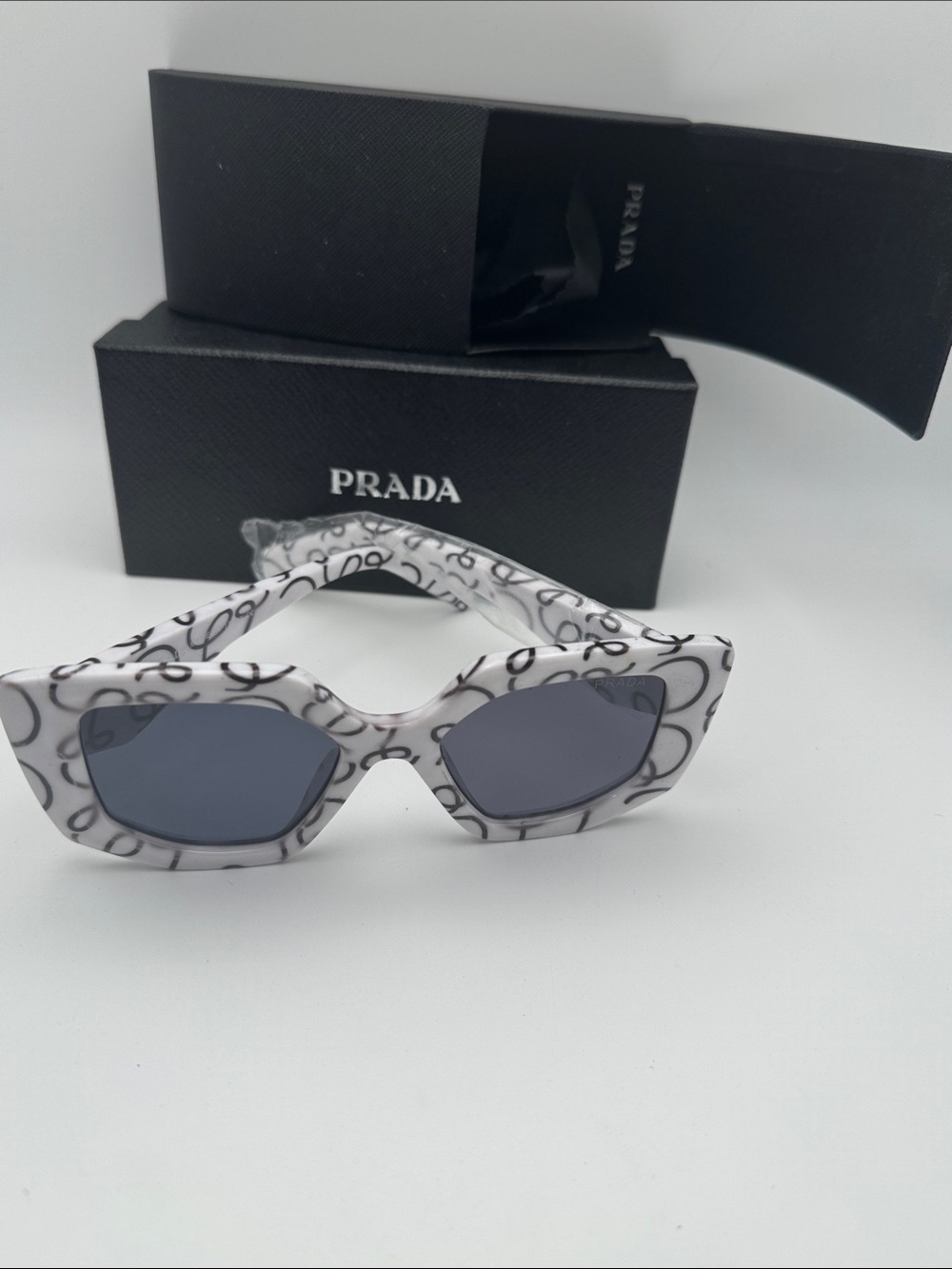 Prada White Patterned Cat-Eye Sunglasses with Dark Lenses